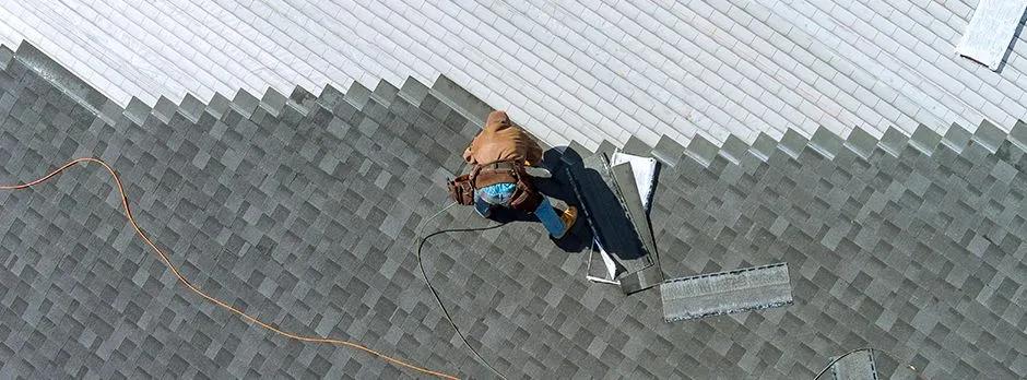 SkyeVantage roofer working on a residential shingle roof in Mid-State Wisconsin